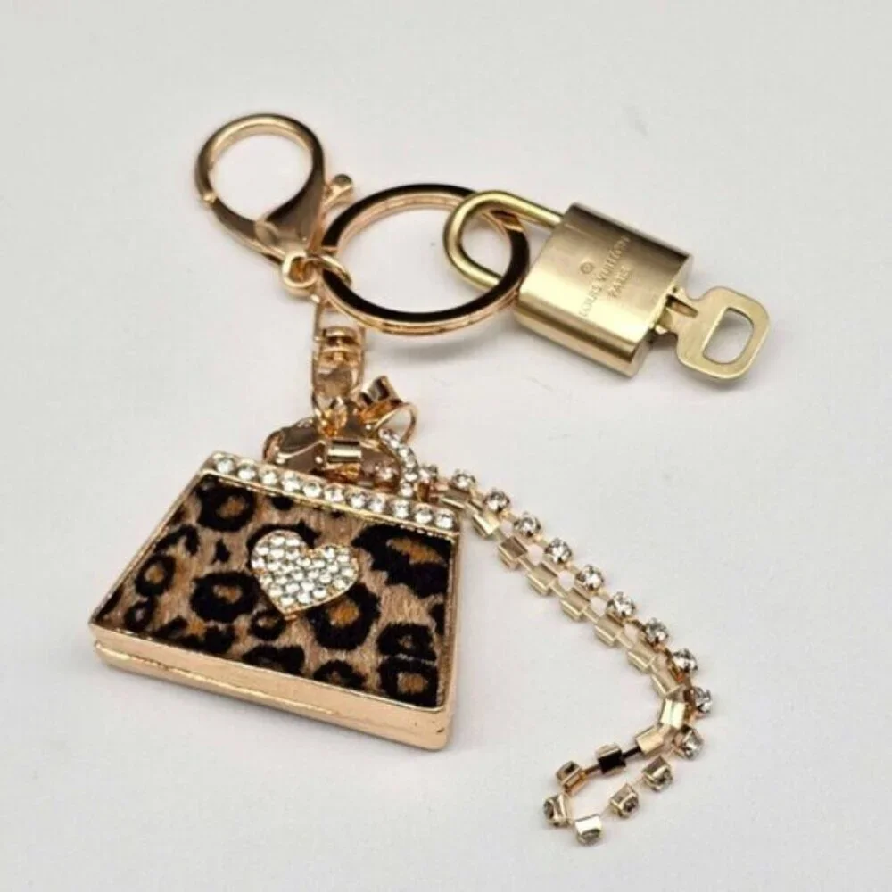 Authentic Louis Vuitton Lock & Key with unbranded Leopard Bagcharm, Keycharm